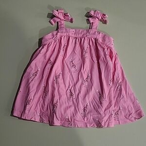 9 month baby girls pink tank top with giraffe on it.